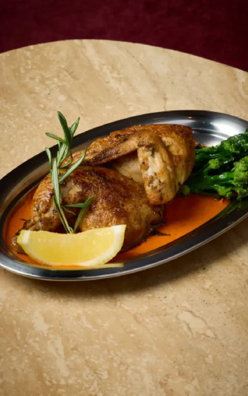 A Half Free range chicken with Romesco